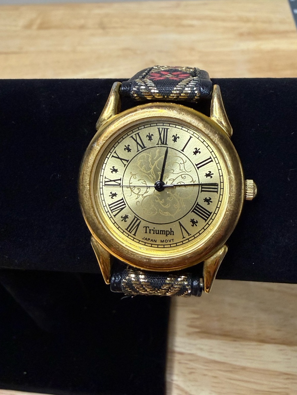 Triumph Vintage Gold-Tone Women’s Watch with Original Patterned Strap EUC